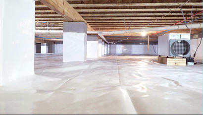 Finished encapsulated crawlspace with a dehumidifier