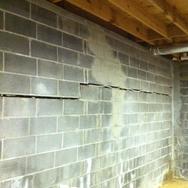Bowing basement wall with large crack