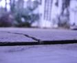 Sunken concrete garage slab with crack