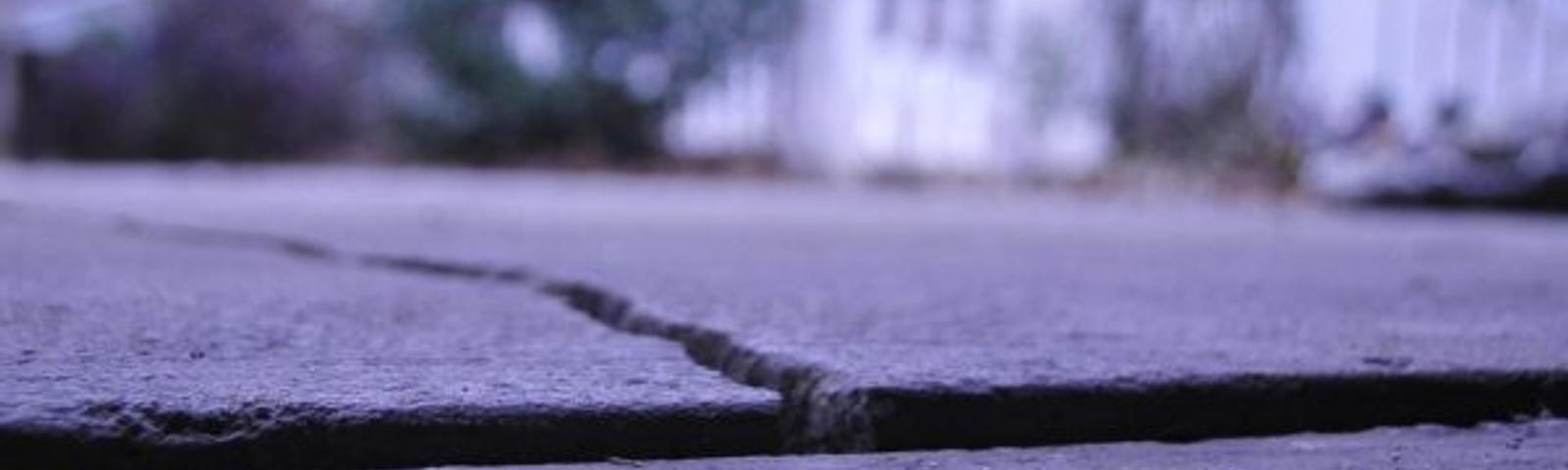 Sunken concrete garage slab with crack