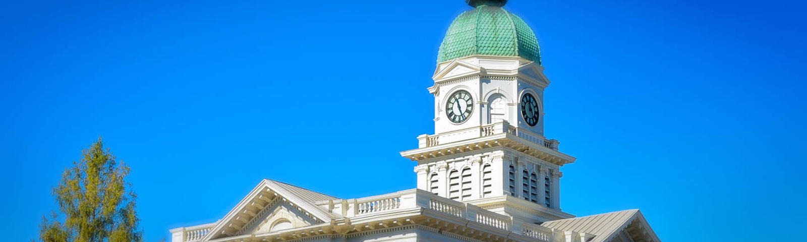 A photo of the clock tower of the city hall building in Athens, Georgia.