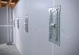 Basement wall anchors mounted in a newly waterproofed basement