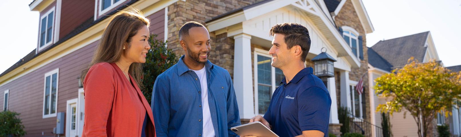 AquaGuard CFI with customers in front of home - desktop hero
