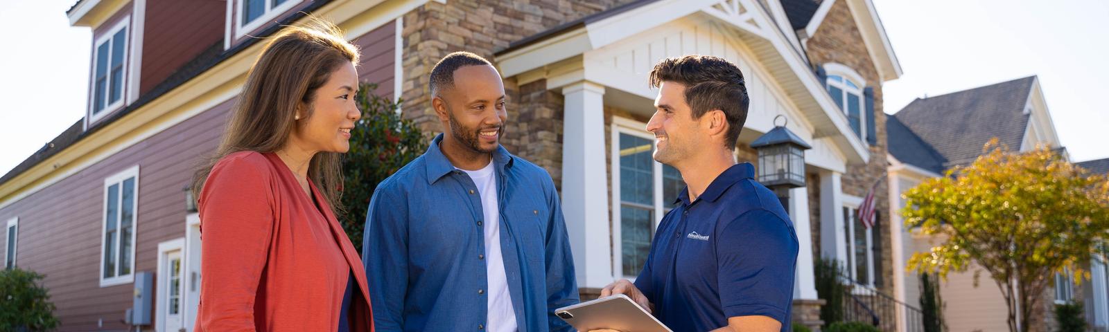 AquaGuard CFI with customers in front of home - desktop hero