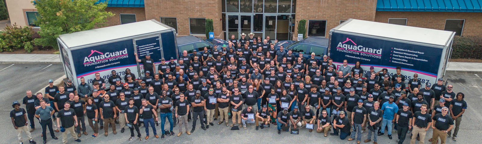 A photo of the entire AquaGuard company gathered to celebrate Ownership Tour!