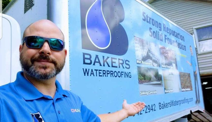Bakers Waterproofing Truck with employee
