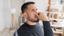 man holding nose because of musty smell in basement