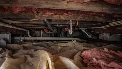 Wet and messy crawl space.
