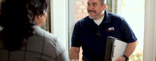 AFS CFI greeting homeowner at front door.