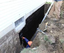 tar coating on exterior wall