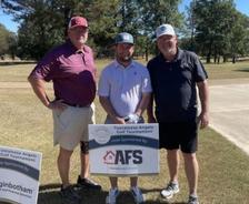 Three AFS crew members at AFS Tuscaloosa Angels Golf Tournament sponsorship event