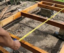 An exposed pier and beam foundation