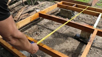An exposed pier and beam foundation