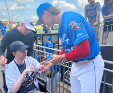 AFS team member's son and baseball player at the Dinosaur Weekend at Toyota Field during the Rocket City Trash Pandas game