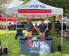 AFS team at sponsorship booth at Peach Jam Jubilee in Clanton