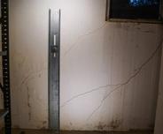 Channel anchors in basement wall.