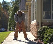 CFI drilling through concrete sidewalk.