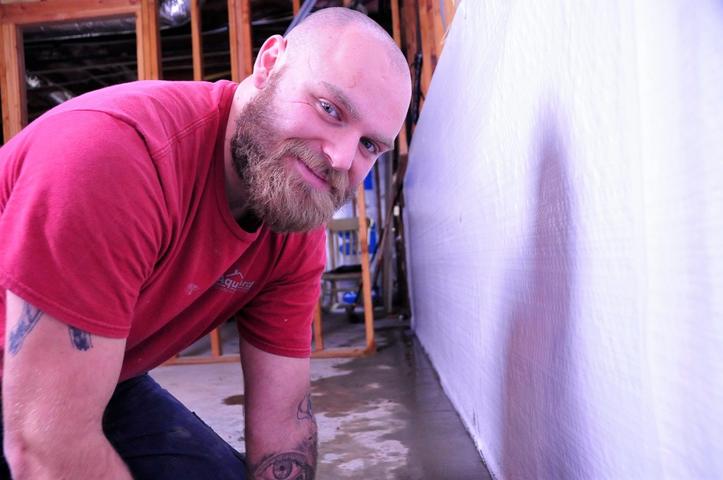 Foundation Systems of Michigan crew member at job site.