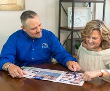 FSM inspector talking with a homeowner