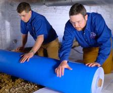 Crew Installing vapor barrier liner