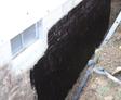 tar coating on foundation wall