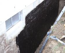 tar coating on foundation wall