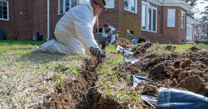 FSM crew members installing exterior drainage
