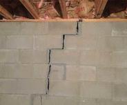 Stair step crack in basement wall