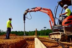 Commercial Foundation Repair: Helical Pier Installation