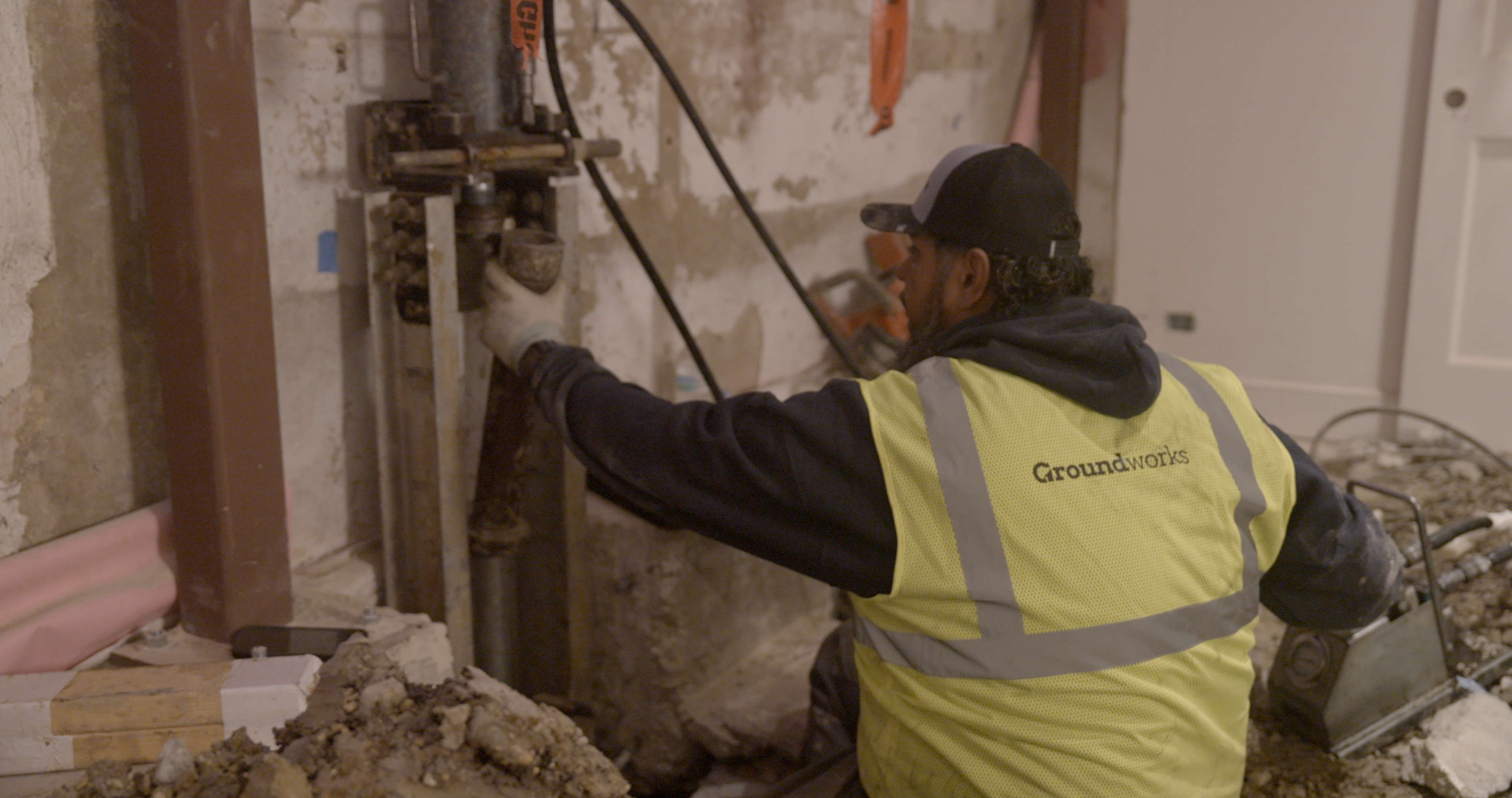 Crew installing foundation piers
