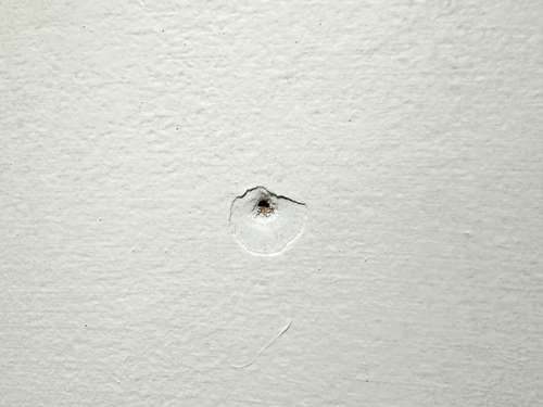 drywall nail pop damage