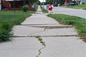 cracked concrete on sidewalk
