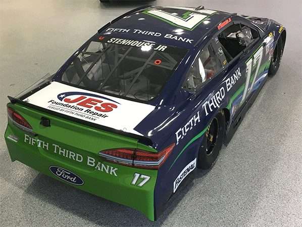 Racing car with Fifth Third Bank and JES Foundation Repair logos, displaying number 17 on the side and rear.