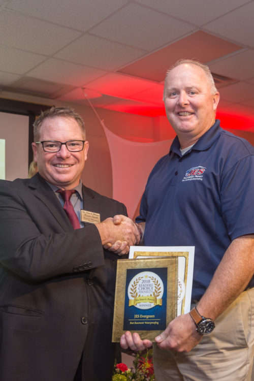 Joe Caruso accepting award.