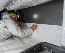 Crew installing Crawl Space Barrier