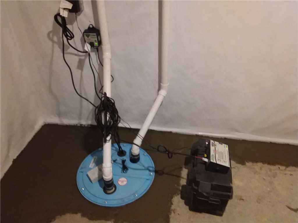 Basement sump pump installed in home with Battery Backup