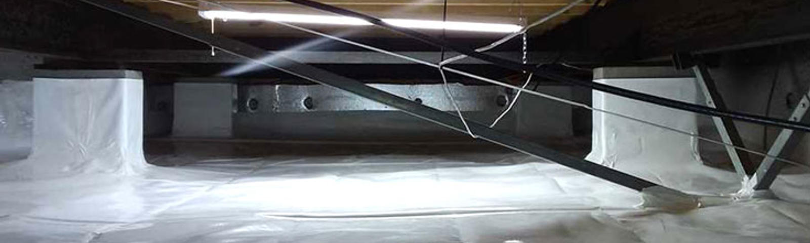 Vapor barrier and thermal insulation in crawl space of a home
