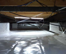 Vapor barrier and thermal insulation in crawl space of a home