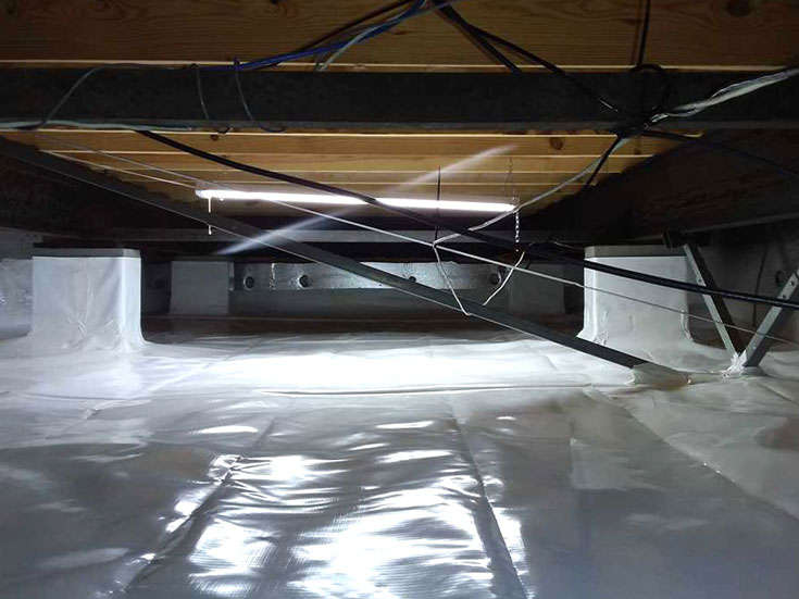 Vapor barrier and thermal insulation in crawl space of a home