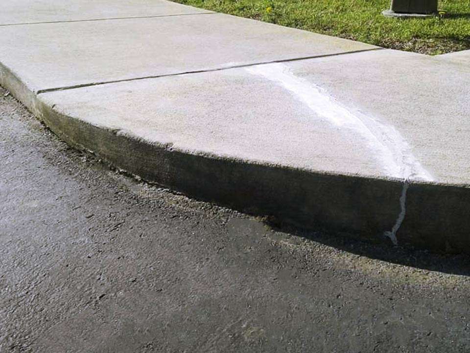 Concrete sidewalk after polyrenewal leveling