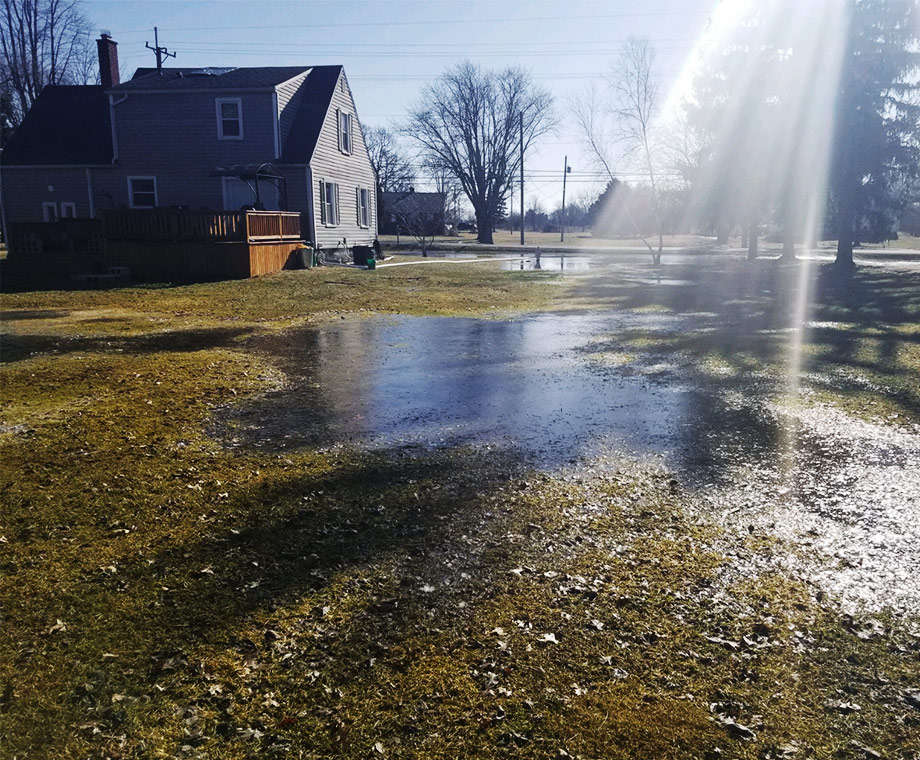 Poor drainage in the front yard of a home