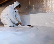 Crew Installing encapsulation