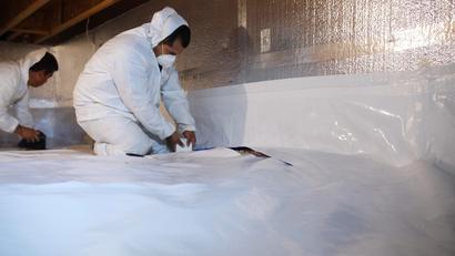 Crew Installing encapsulation