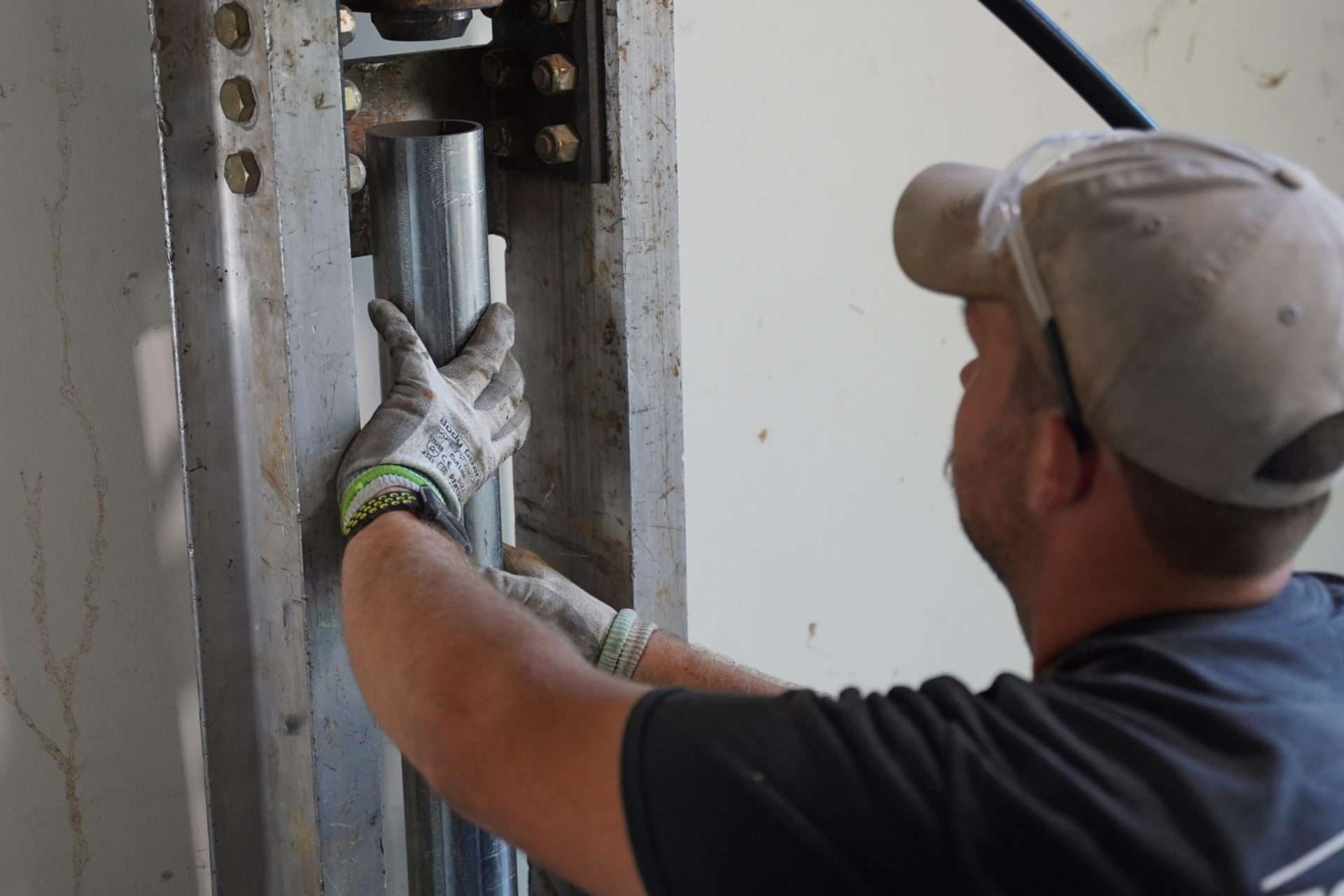 crew member installing push piers