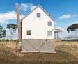 Illustration of a house with severe foundation cracks and tilting chimney, showing subsidence issues.