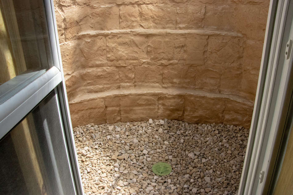 egress window well with drainage