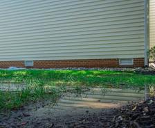 flooded yard near house