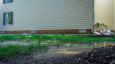 flooded yard near house