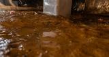 water on dirt crawl space floor