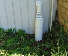 freezeguard installed on exterior sump discharge line